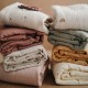 Mushie Swaddle Blanket Cognac